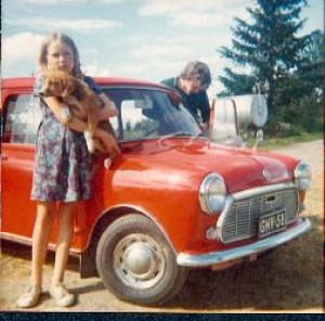 My wife Sari aged about 9.In the background her brother is caring for the great love of his life. 